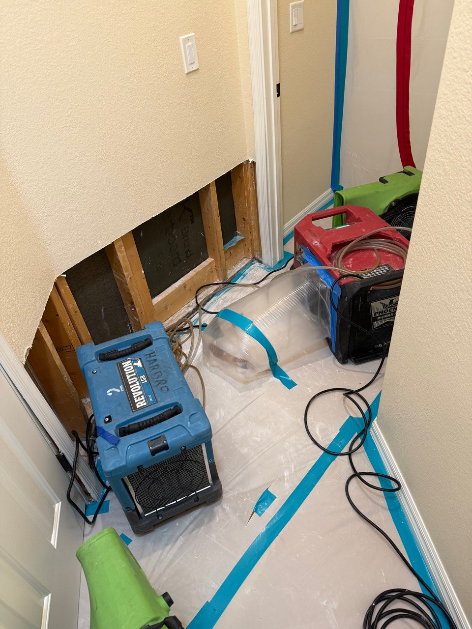 Drying equipment and protected hallway floor in the Sun City Anthem project