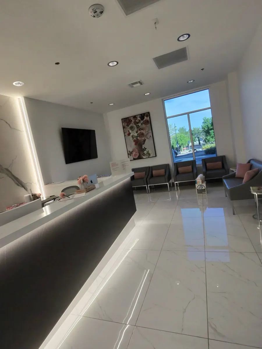 Finished waiting room and reception counter in an office suite near Queensridge