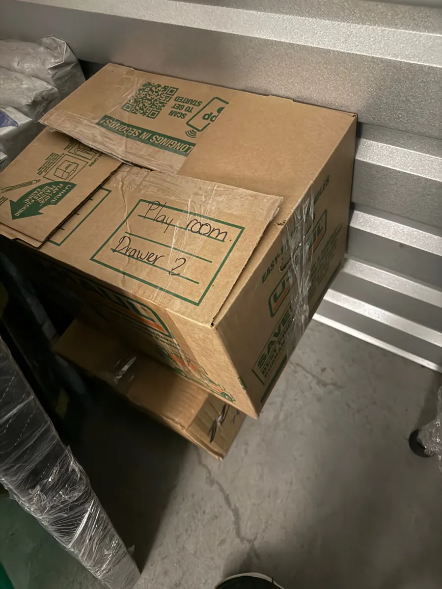 Moving box labeled by room and drawer number from a Red Rock Country Club pack-out