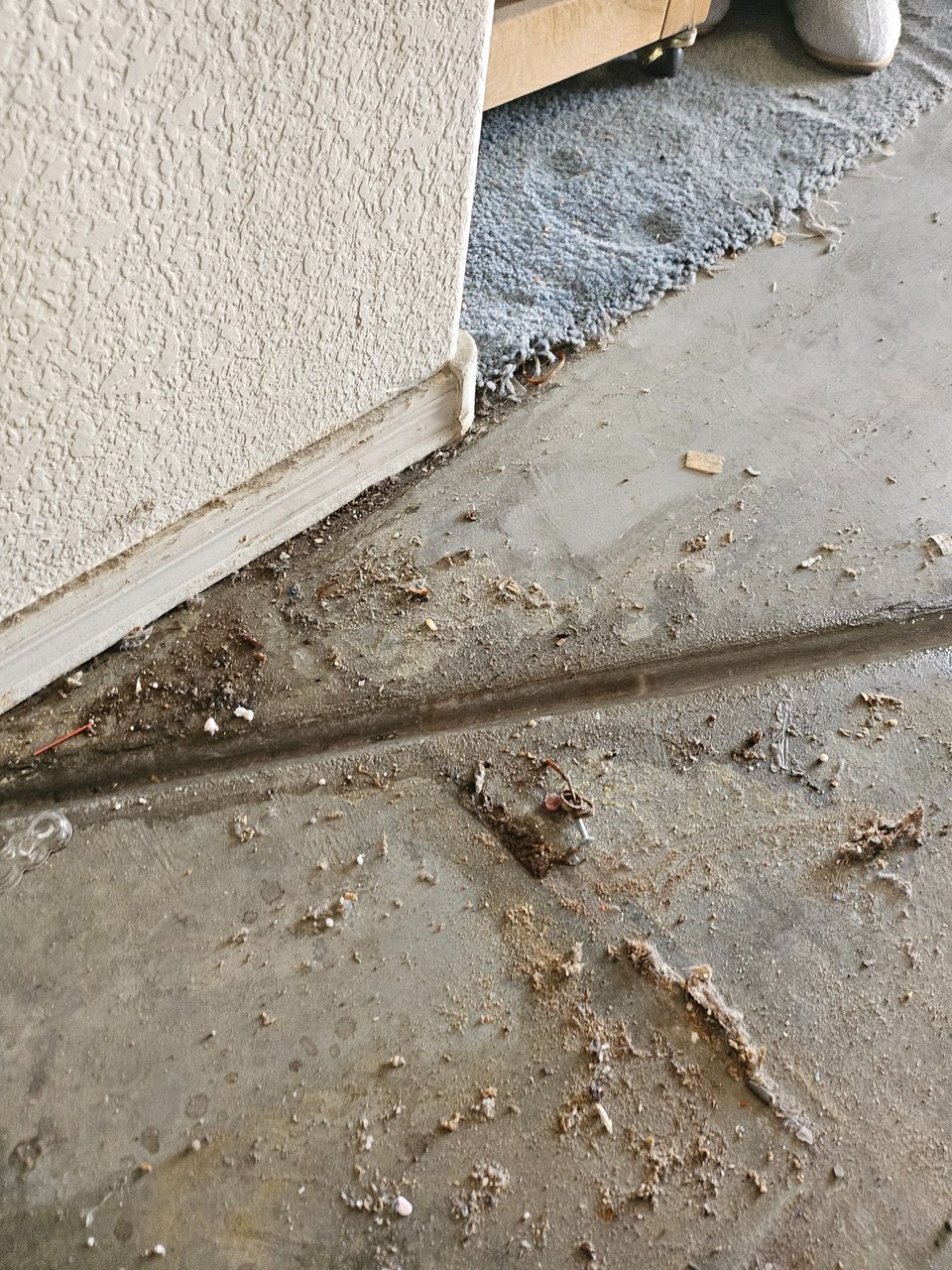 Wall base and adjoining exposed floor in the Sun City Summerlin project