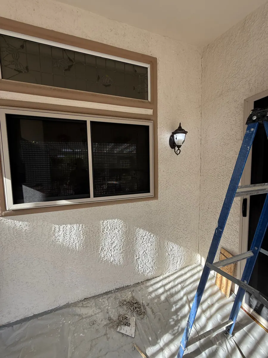 Patio wall with stucco repaired and textured to match in a Sun City Summerlin home