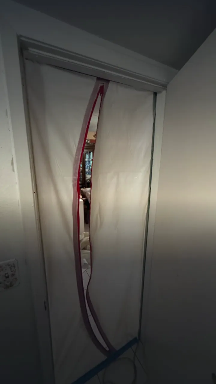 Quality 1st Restoration sets up plastic containment during water damage repairs in Las Vegas.