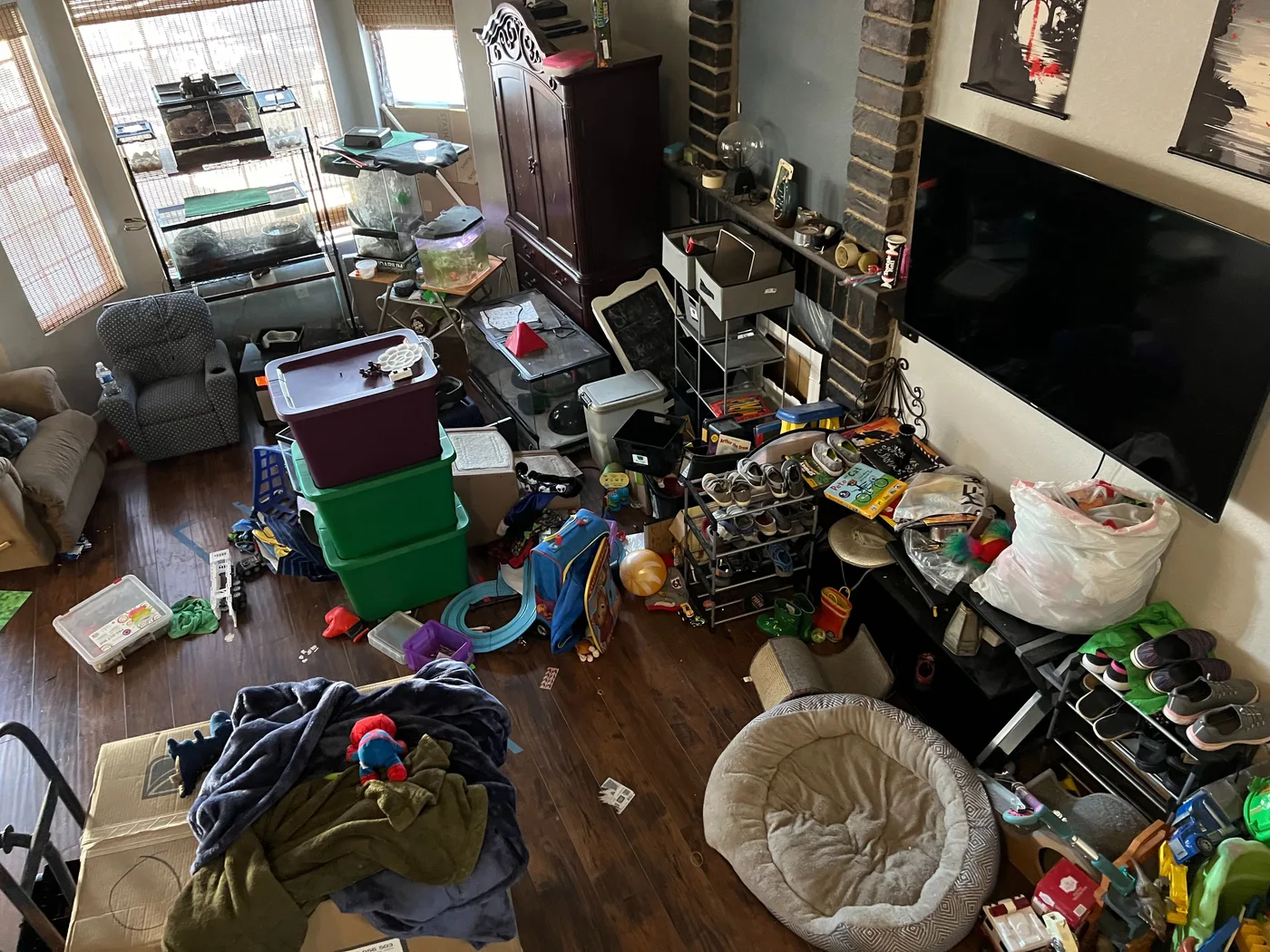 Cluttered living room before a hoarding cleanup in Henderson