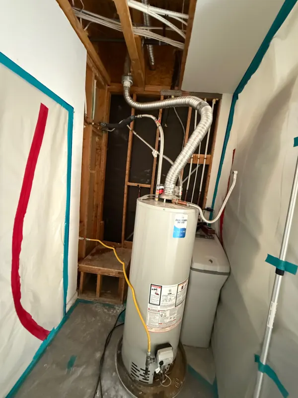 Moisture meter reading on framing during structural drying in Henderson