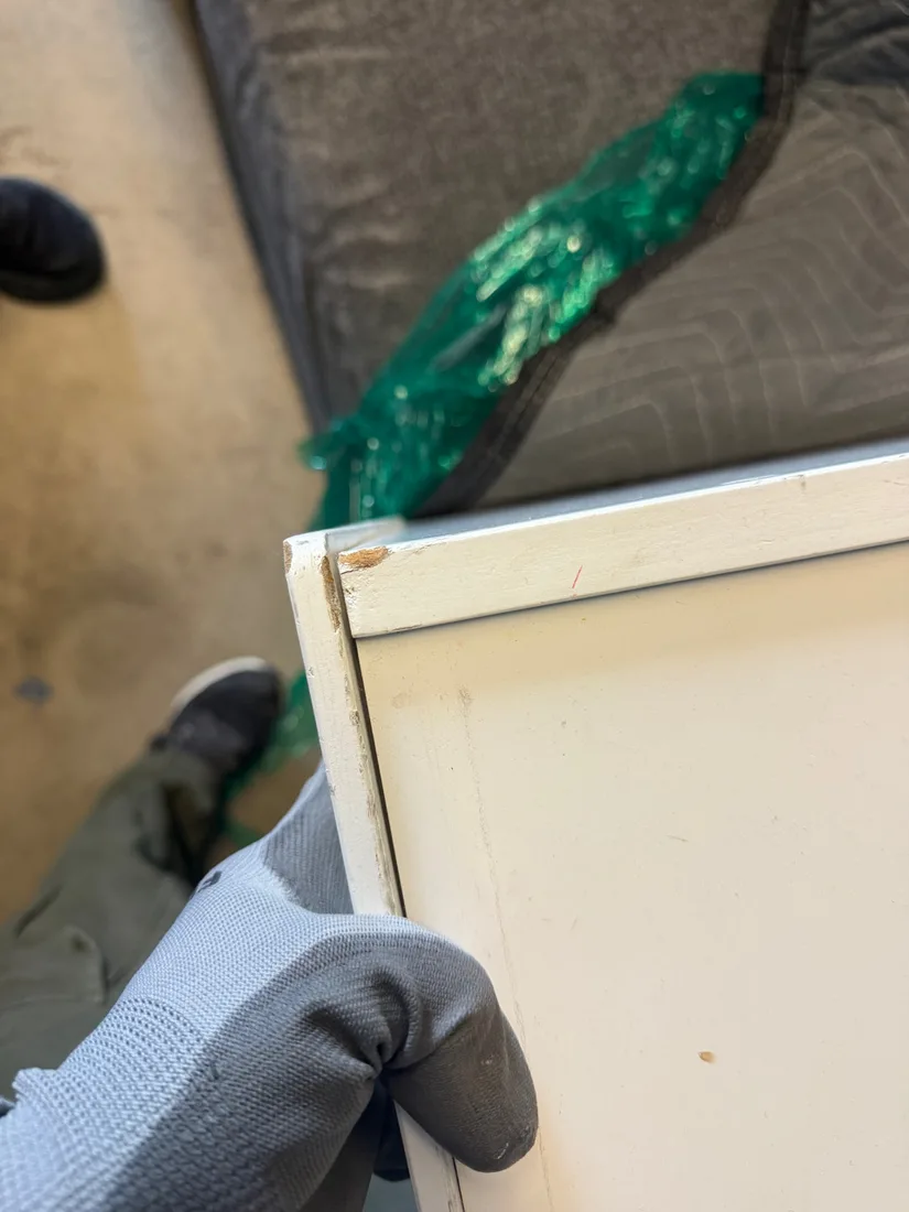 Technician in gloves removing affected contents during specialty cleaning in Henderson